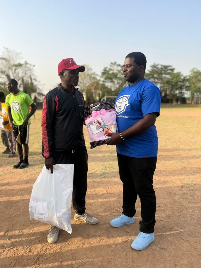 The MD RSFL presenting gift items to the Head Coach, Deli fresh FC 